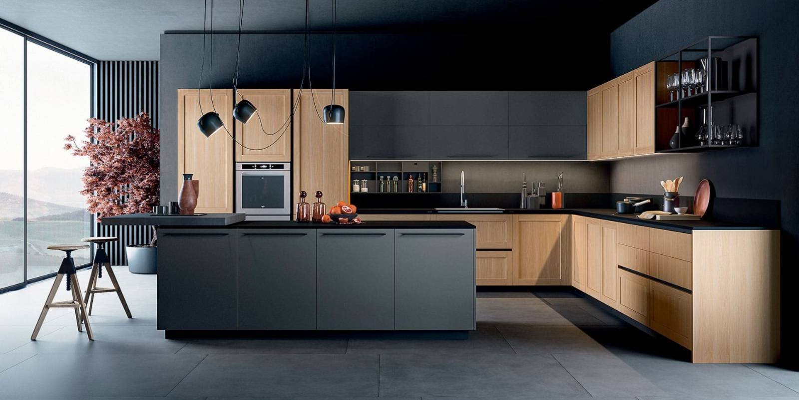 Exemple de modèle de cuisine design sur mesure avec îlot central pour espace ouvert à Saint Cyr sur Mer dans le 83